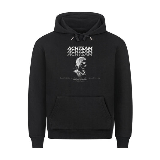 Achtsamkeit Premium Hoodie in black with front pocket and metal-tip drawstrings.